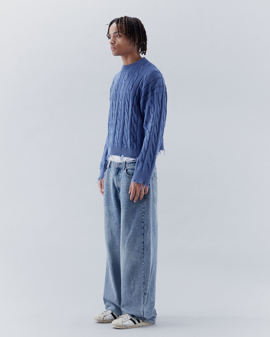 Men's and Women's Ripped Cable Knit Sweaters