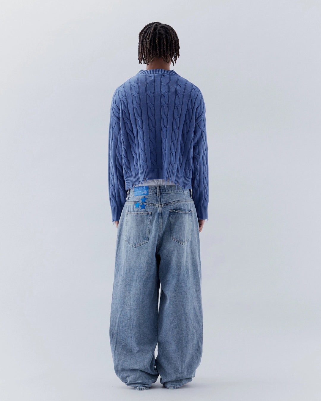 Men's and Women's Ripped Cable Knit Sweaters