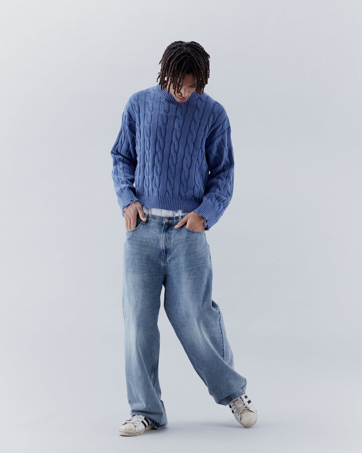 Men's and Women's Ripped Cable Knit Sweaters